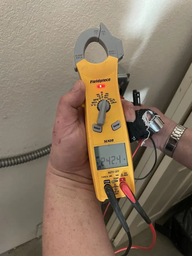Voltage testing with clamp meter during Circuit Breaker Repair in Patterson